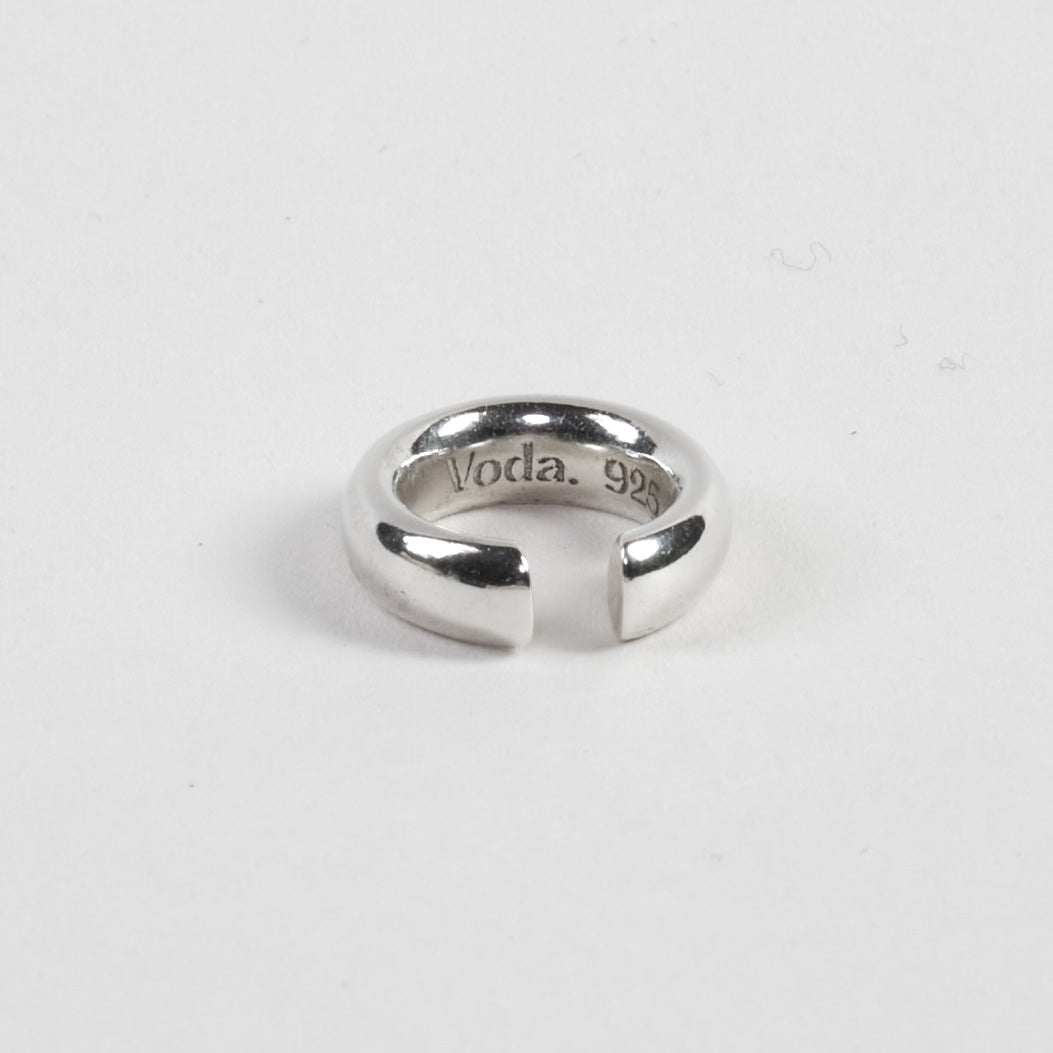 Chunky ear cuff made from 100% recycled 925 sterling silver – thick-walled design with a bold look, sitting comfortably in the middle of the ear. Features the Voda. logo as a mark of quality and pairs perfectly with other cuffs. Sustainably crafted in Europe, hypoallergenic, with a special alloy to reduce tarnishing.